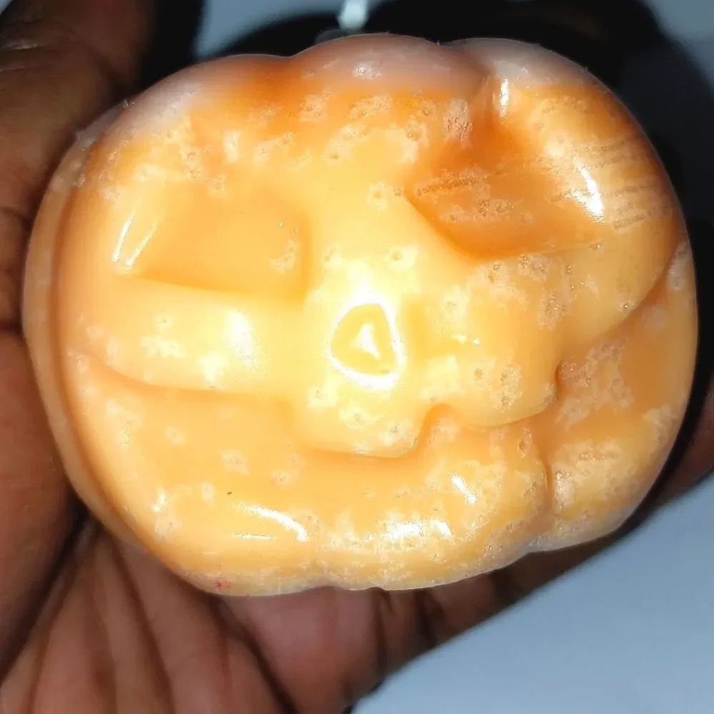 Hand crafted limited edition pumpkin candle from our spooky candle collection